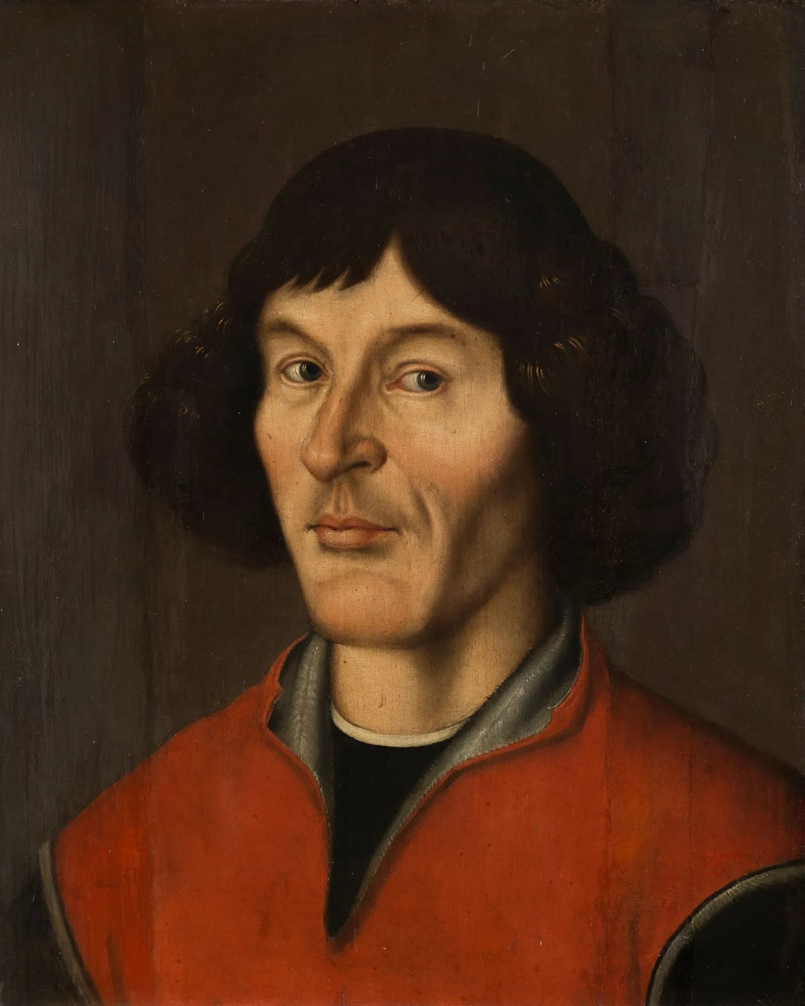 A painting of a man with dark hair and a serious expression wearing a red tunic with a dark shirt underneath.